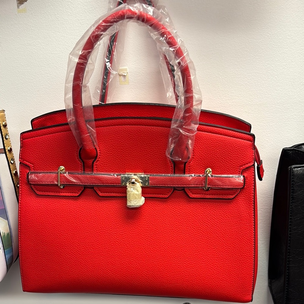 Red Designer Handbag with Lock Detail